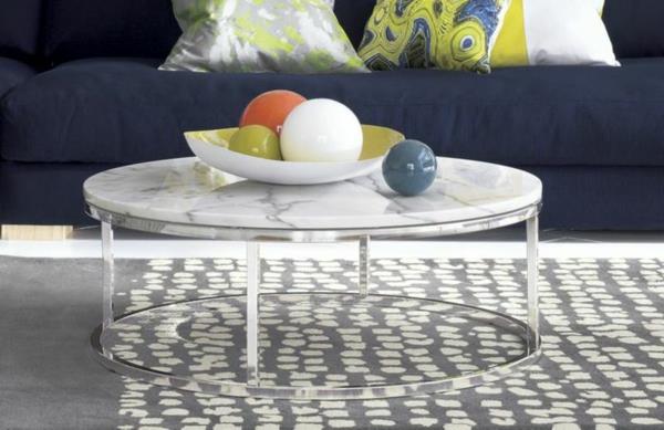 pyöreä sohvapöytä marmoriset metallijalat olohuoneen sisustusideoita