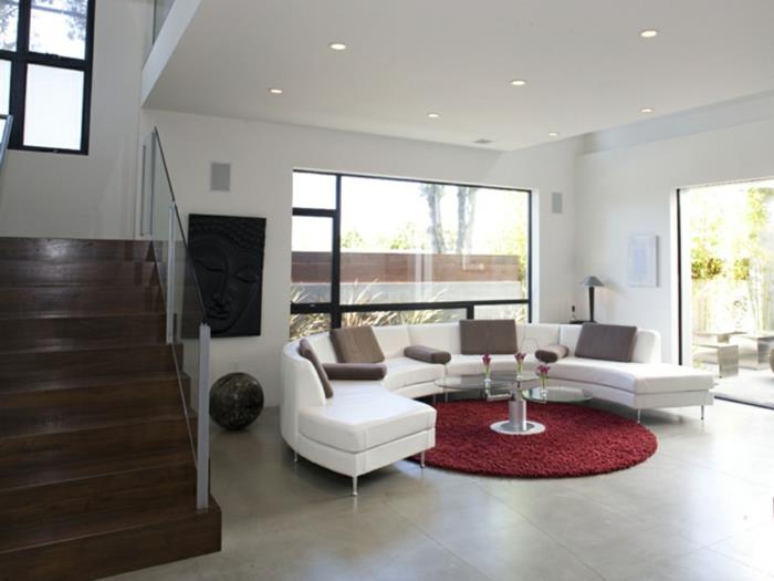 pyöreä matto olohuone punainen valkoinen sohva lattialaatat