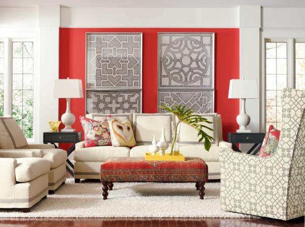 tyylikäs olohuoneen sisustus nojatuoli sohva punainen seinä