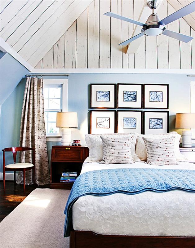 makuuhuoneen siniset seinät ruskeat huonekalut viisto katto