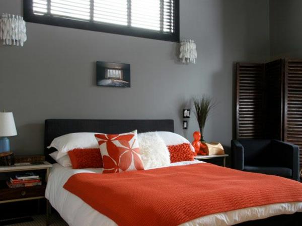 makuuhuoneen suunnittelu moderni seinäväri harmaa sävyt päiväpeite oranssi
