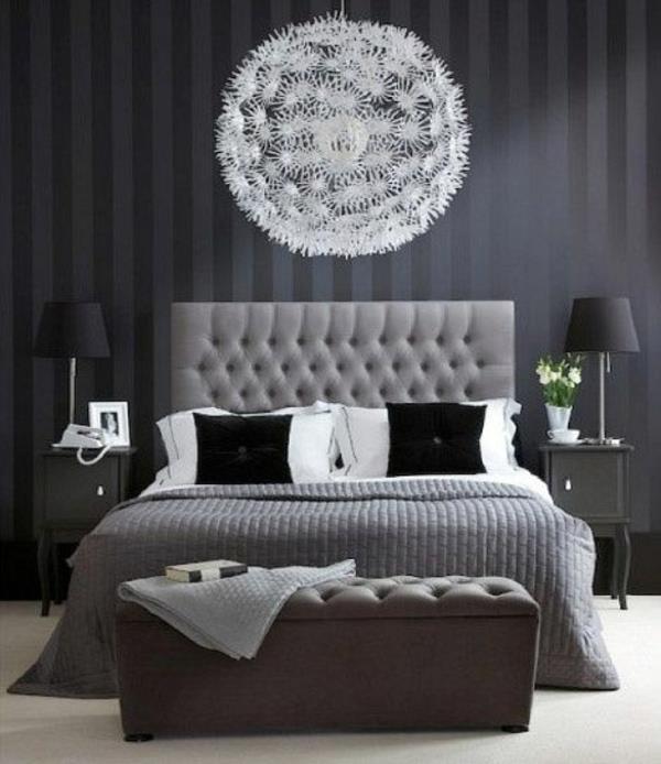 makuuhuoneen seinän väri harmaa sävyt valkoinen kattokruunu sänky