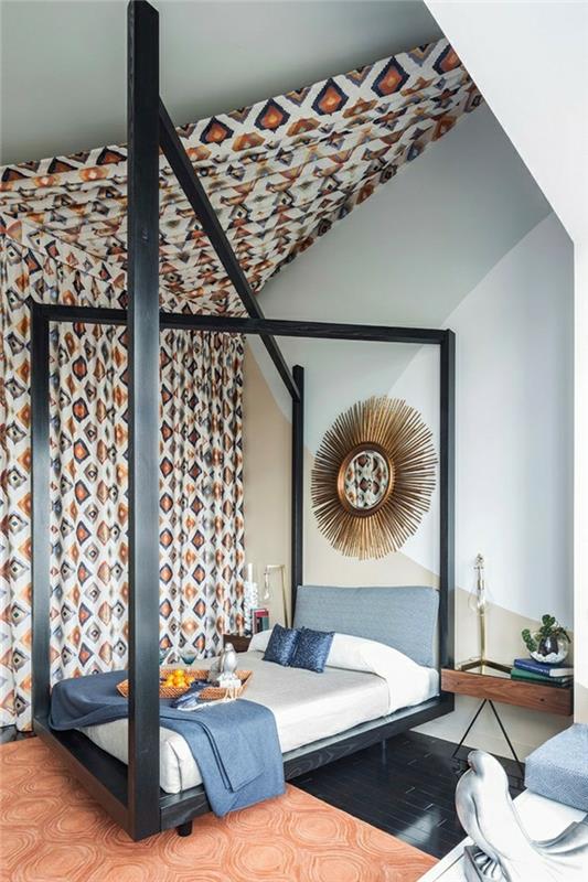 Kalusta makuuhuone, jossa on viisto katto, koristele tekstiilivuoteella