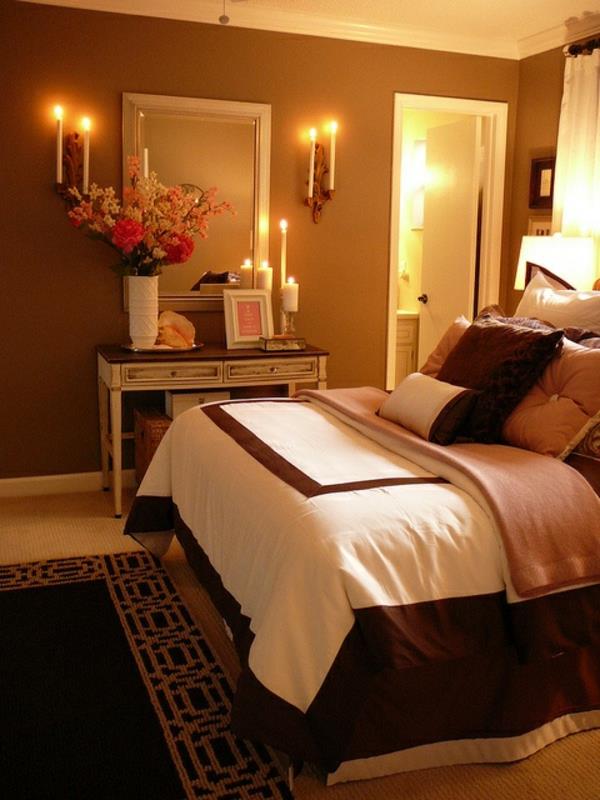 makuuhuoneen sisustusideoita ruskeat värit sängyn kynttilät