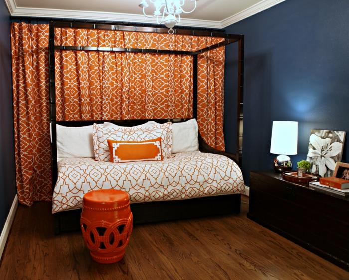 makuuhuoneen sisustusideat vierashuoneen suunnittelu kauniit kuviot oranssi aksentti