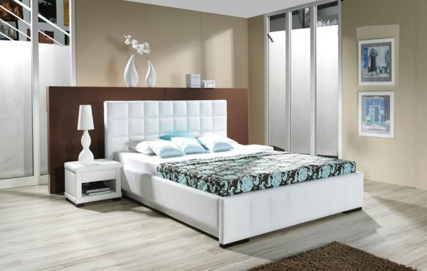 makuuhuoneen sisustusideoita verhoiltu sänky valkoinen seinäväri beige