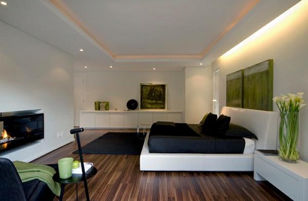 makuuhuoneen värit ideat valkoiset seinät mustat aksentit matto sänky
