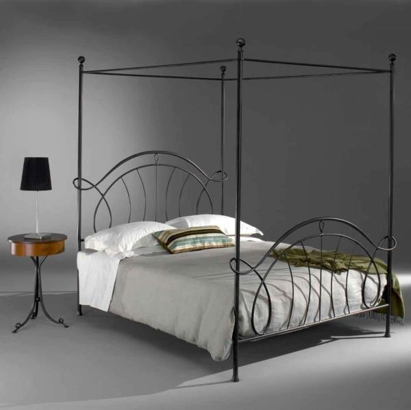makuuhuoneen muotoilu metallisänky pylvässänky takorauta vintage design pyöreä sivupöytä yökonsoli pöytävalaisin ambar muebles