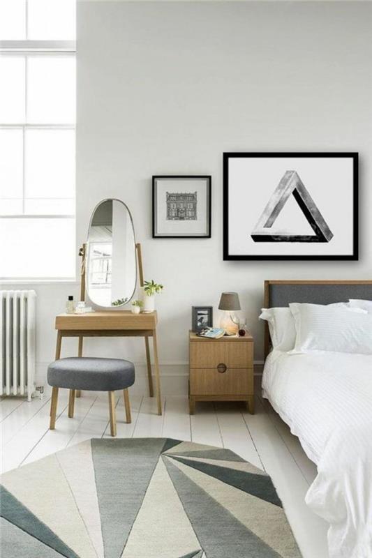 makuuhuone valkoinen geometrinen matto valkoinen vuodevaatteet peilipöytä