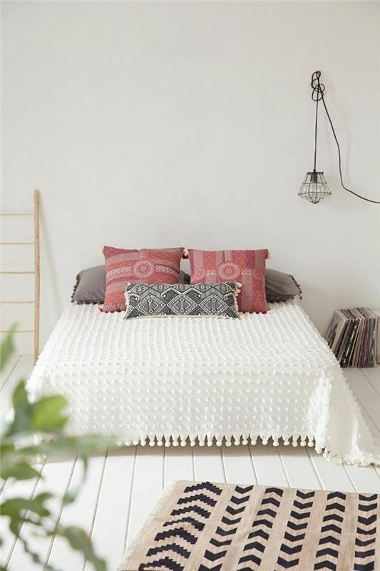 makuuhuoneen suunnittelu skandinaavinen muotoilu sisustussuunnittelu kuvioidut tyynyt valkoinen päiväpeite
