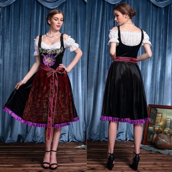 kauniita dirndl -trendejä valkoisella dirndl -puserolla