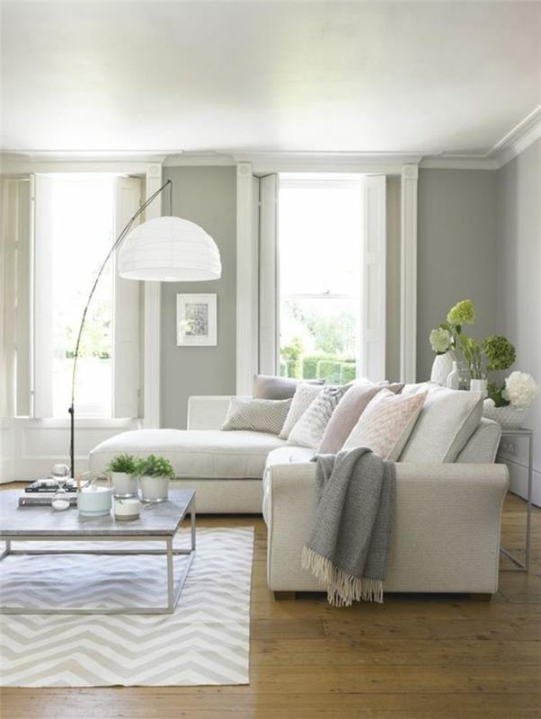 kauniit sohvat valkoinen kulmasohva matto harmaat seinät