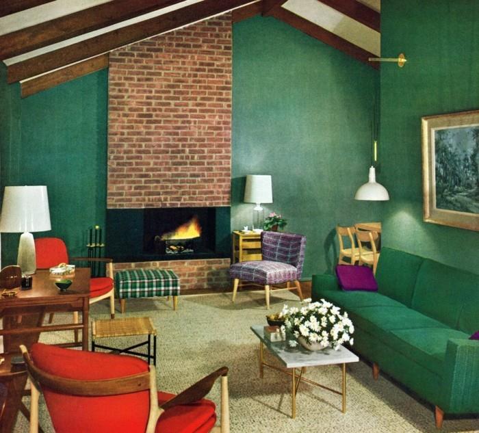 kaunis olohuone vihreä sohva punaiset nojatuolit