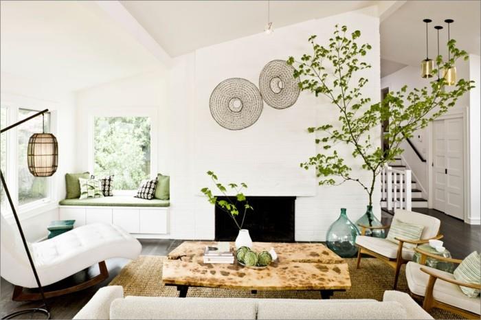 kaunis olohuone sisal matto kasvit valkoiset huonekalut takka
