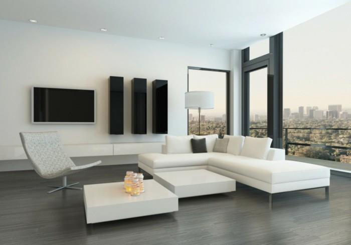 kaunis olohuone valkoiset huonekalut mustat seinähyllyt harmaa lattia