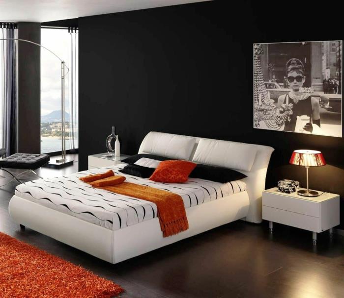 musta seinäväri valkoinen sänky makuuhuone oranssi aksentti