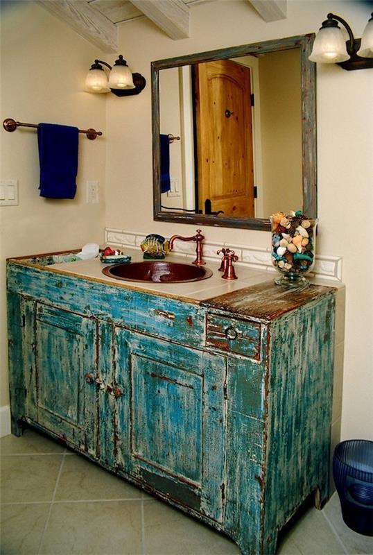 nuhjuinen tyylikäs kylpyhuone hieno pesuallas pöytä vihreä aksentti