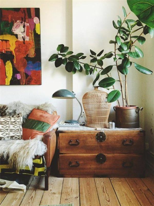 nuhjuiset tyylikkäät huonekalut boho -tyylinen sisustustyyli puulattiat puinen sivupöytä vintage -heitotyynyt sohva karitsannahka