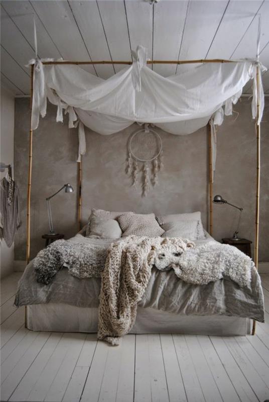 nuhjuiset tyylikkäät huonekalut boho-tyylinen makuuhuone bambu-pylvässänky lampaannahka neulottu villapeitto puulattiat