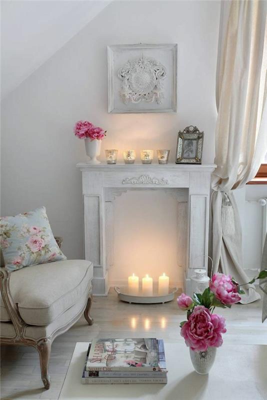nuhjuinen tyylikäs olohuone ideoita deco takka valkoiset koristeet nojatuolit kynttilät pionit