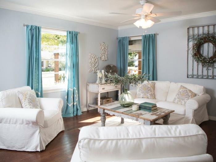 nuhjuinen tyylikäs olohuone ideoita diy sohvapöytä puiset lankut vintage lipasto sininen verhot