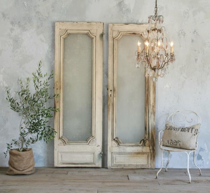 nuhjuinen tyylikäs olohuone ideoita kristalli kattokruunu vanhat ovet puu