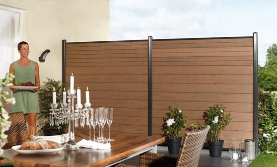 Yksityisyyden suoja puutarhassa - luo ulkoruokailutila Yksityisyyden suoja puutarhan varjossa luovuttajan seinän ruokailutilassa