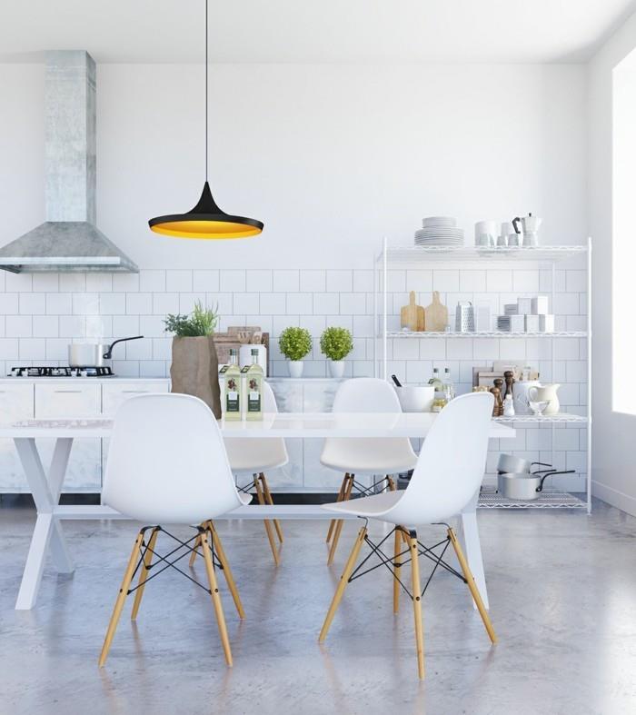 skandinaavinen muotoilu ruokasalissa valkoiset huonekalut ja tummat riippuvalaisimet