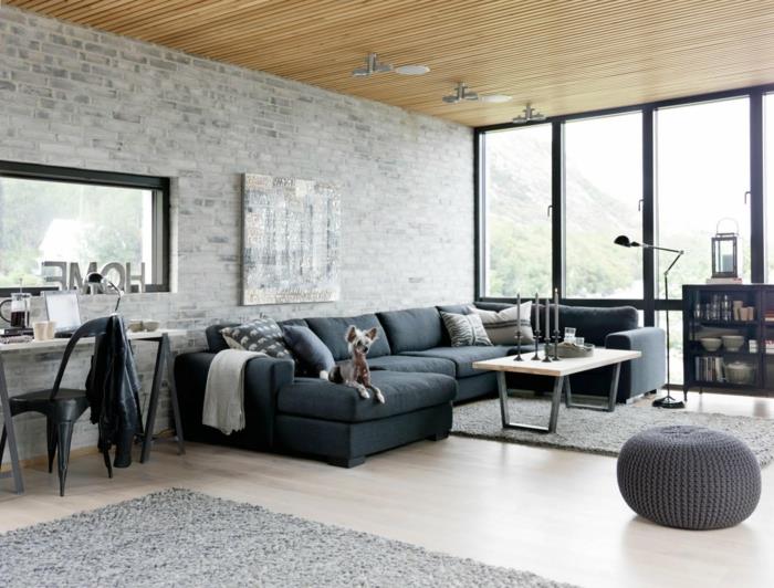 sohva harmaa olohuone teollinen avoin suunnitelma