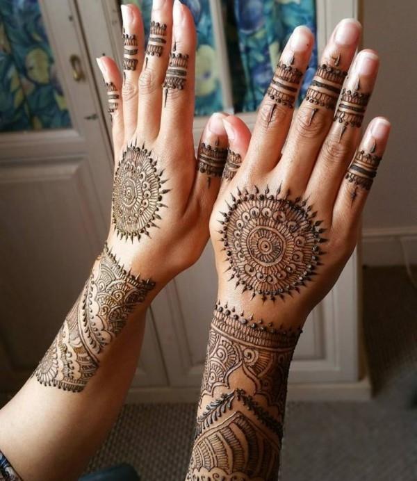 aurinko motiivi henna tatuointi ideoita