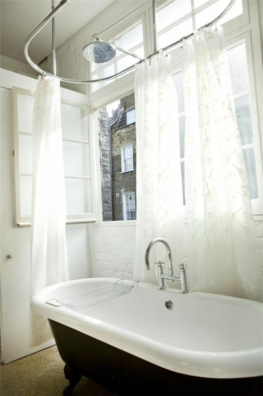 tyylikäs lontoolainen huoneisto vintage kylpy kynsiä jalka