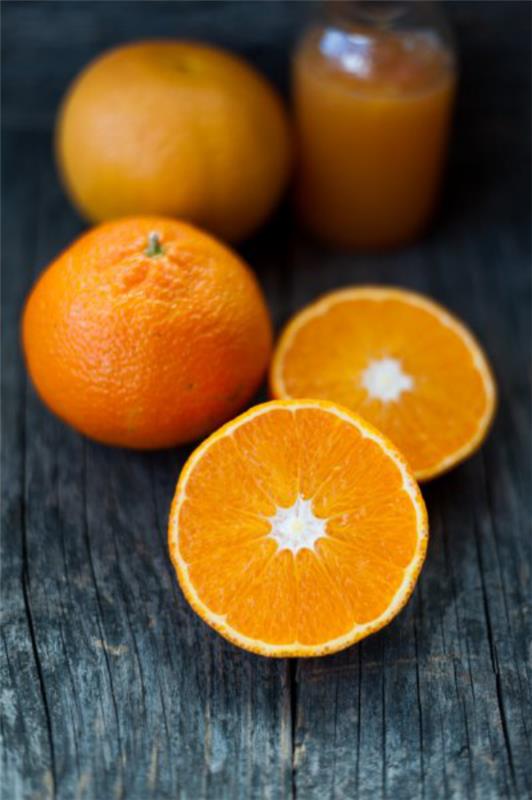 hehkuva kasvojen iho terveelliset ruoat appelsiinit terveydelle syövät paljon c -vitamiinia