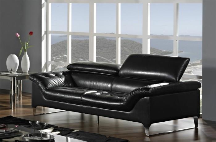 erittäin tyylikäs design -sohva mustasta nahasta