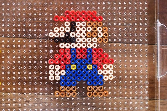 Super Mario -malli rautahelmillä