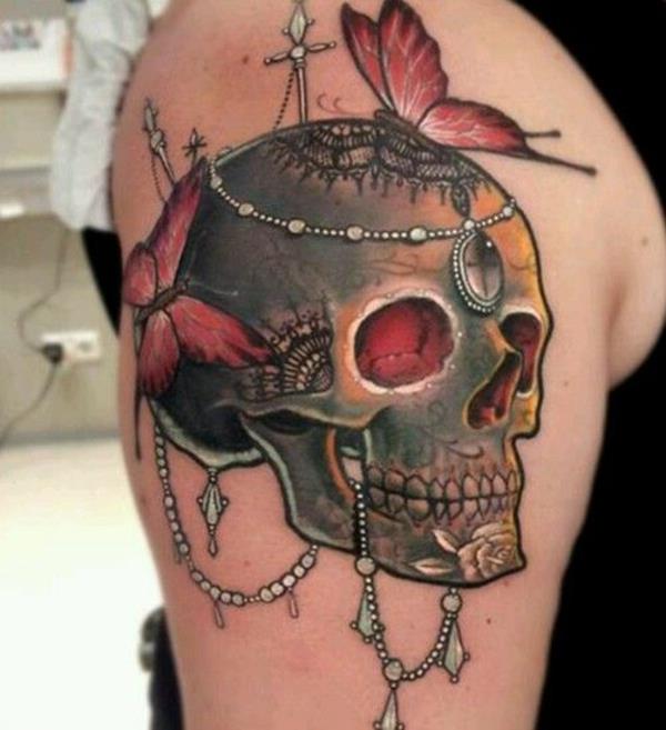 tatuointi olkavarren ideoita kallo perhoset motiivit viileä