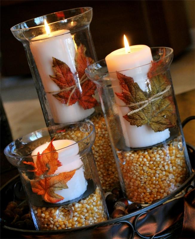 pöytä sisustus ruokasali kynttilänjalka maissin ytimet syksyn lehdet