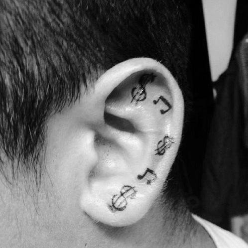 Hangjegy szimbolikus tetoválás