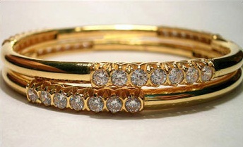 Designer guldarmbånd besat med diamanter