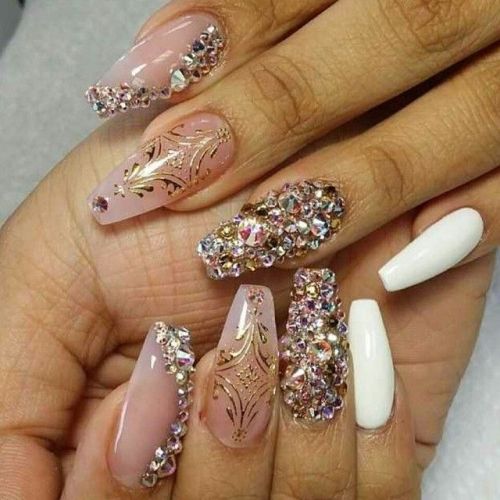 Stones Nail Tattoo Designs