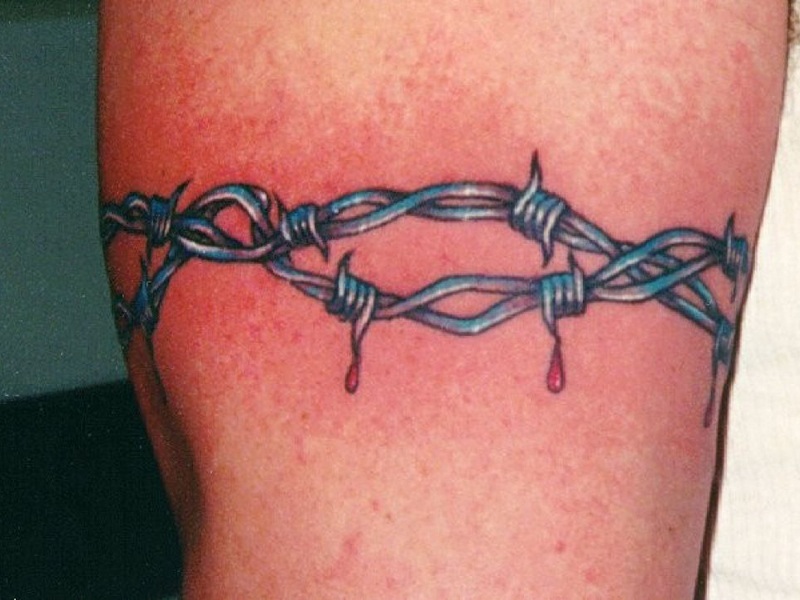 Slående tatoveringsdesign med pigtråd
