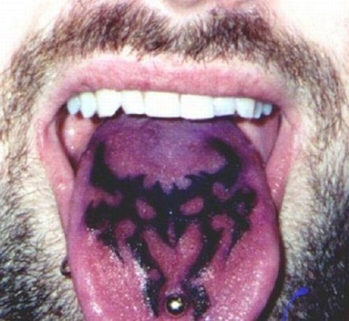 Devil Tribal Tongue Tattoo Design