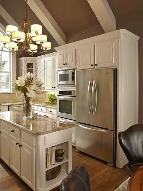 keittiö valkoinen keittiökalusteet keittiösaari sisäänrakennettu jääkaappi