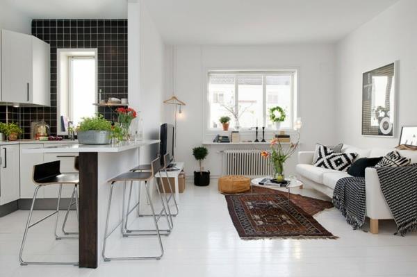 viileä asunto design valkoinen sisustus olohuone ruokailutila keittiö