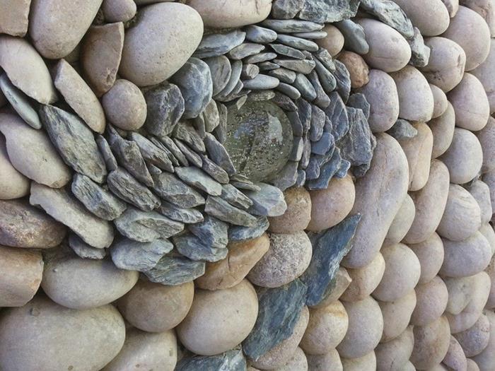 kuiva kiviseinä luonnonkivet muuraus muuraus pyöreät kivet lasipallo