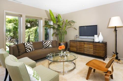 trooppinen tunnelma kotona olohuone pyöreä sohvapöytä seepra kuvio
