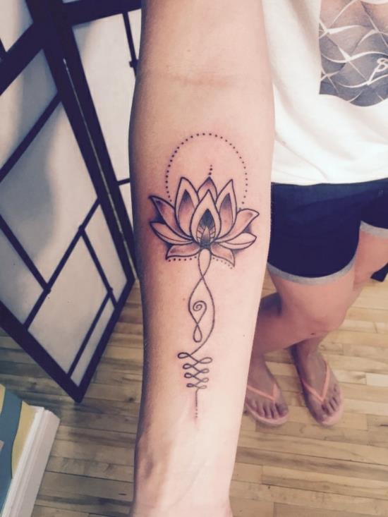 kyynärvarren unalome tatuointi lotus varjo