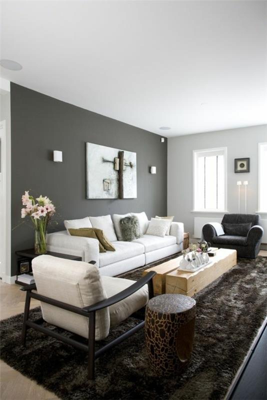 seinäsuunnittelu harmaa olohuone design sohva nojatuoli matto