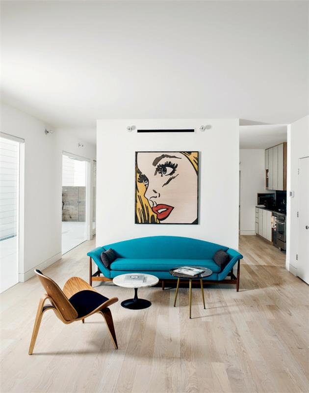 seinän väri valkoinen seinäsuunnittelu olohuone pop art seinätaide sininen sohva skandinaavinen huonekalusuunnittelu