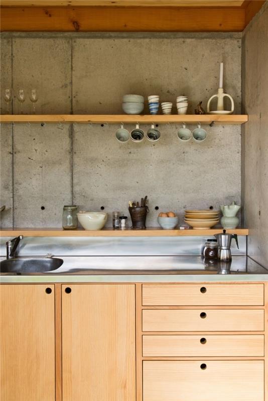 Yhdistä keittiön seinärakenne betoniin ja puisiin keittiökaappeihin