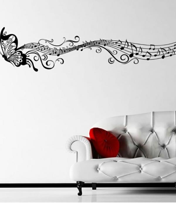 seinän suunnittelu-nuotit-valkoinen-olohuone-sohva